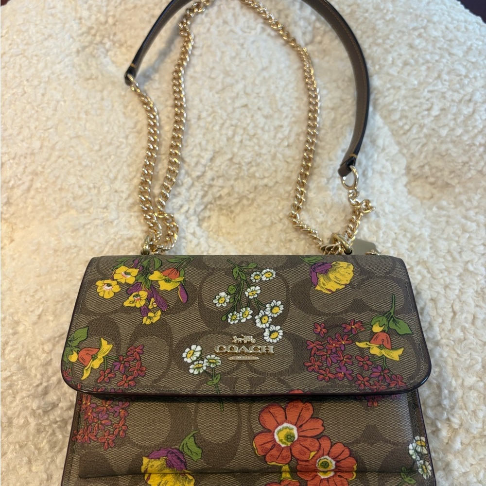 Coach Crossbody Bag with Floral Print.